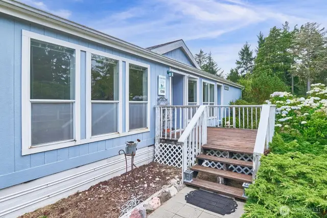 Welcoming east-facing front porch - a great place to start the day!