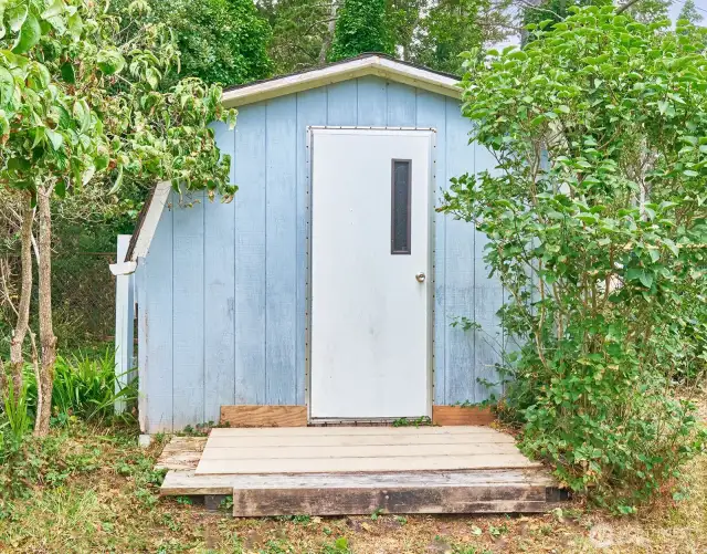 Shed for storing yard equipment and gear.