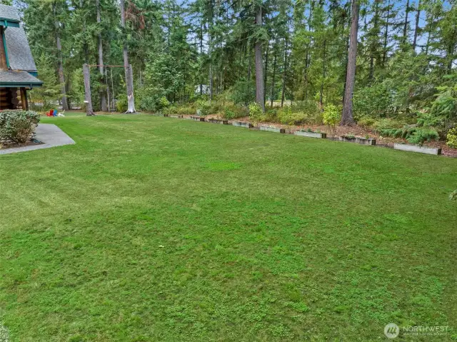 Large Level Yard Perfect for Outdoor Games and Entertaining.
