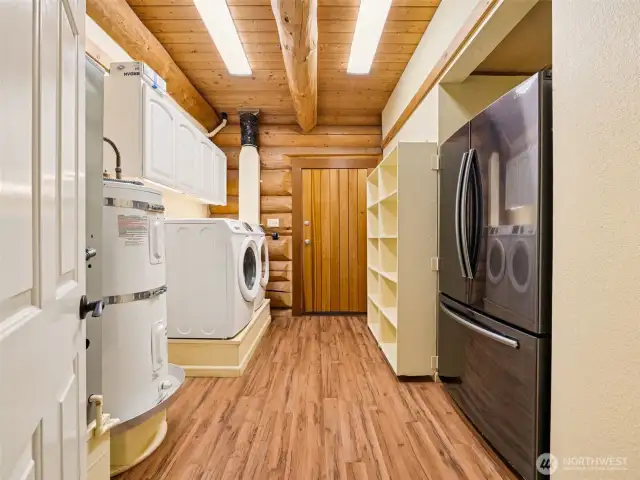 Main Floor Utility Room with Door to Backyard.