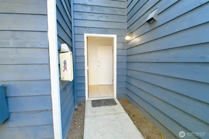 Side entry to home. Great space for a mud room.
