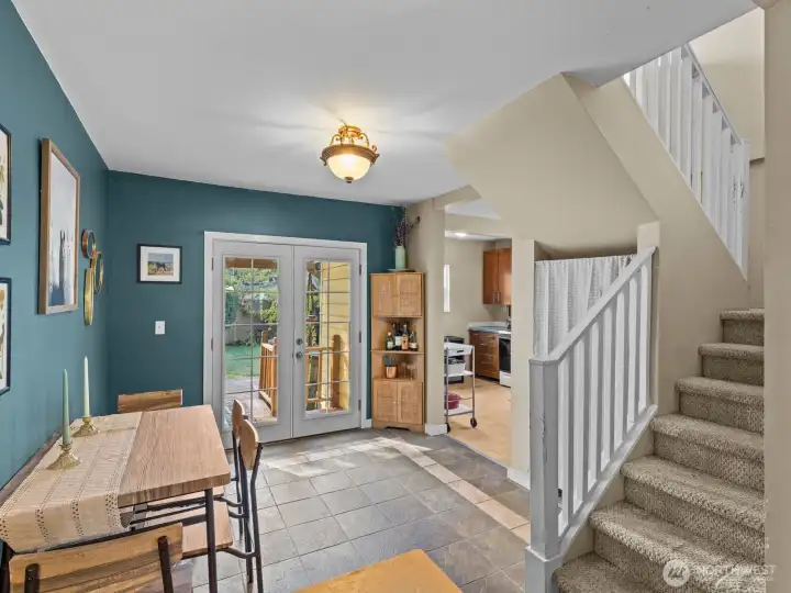 You'll pass through the dining area on your way to the kitchen.