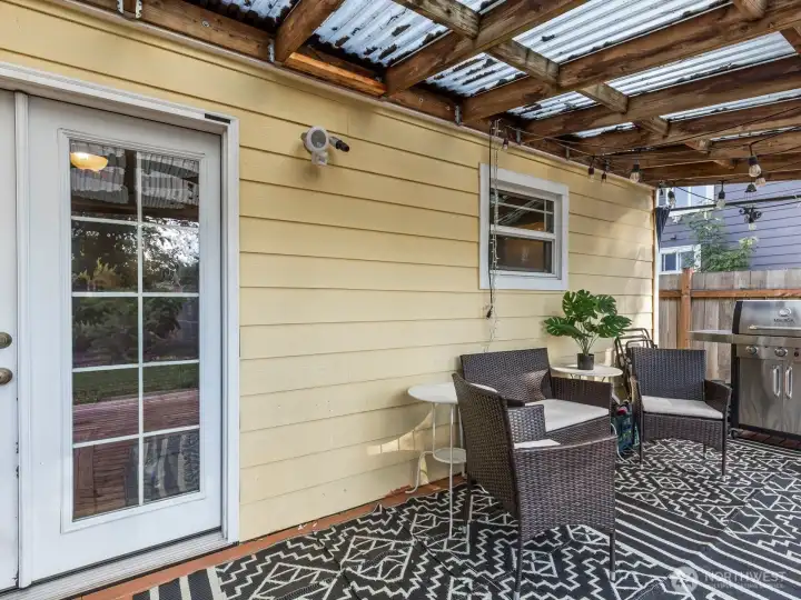 Nice sized back deck is covered for year-round enjoyment.