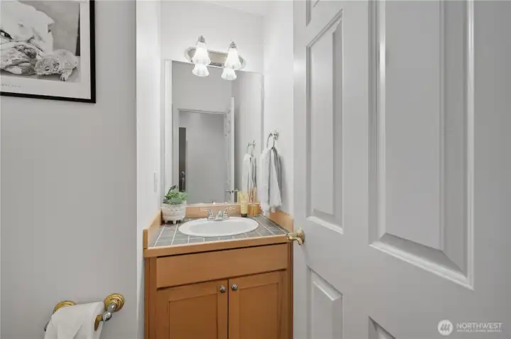 Convenient Half bath located near the front door.