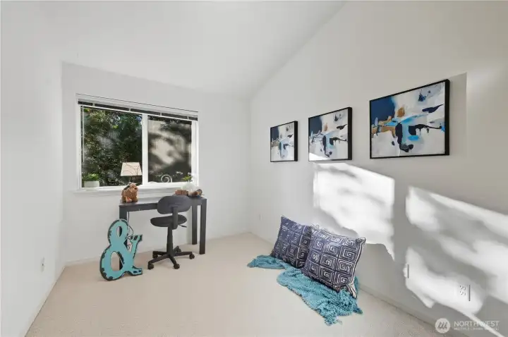 1st bedroom currently staged as an office