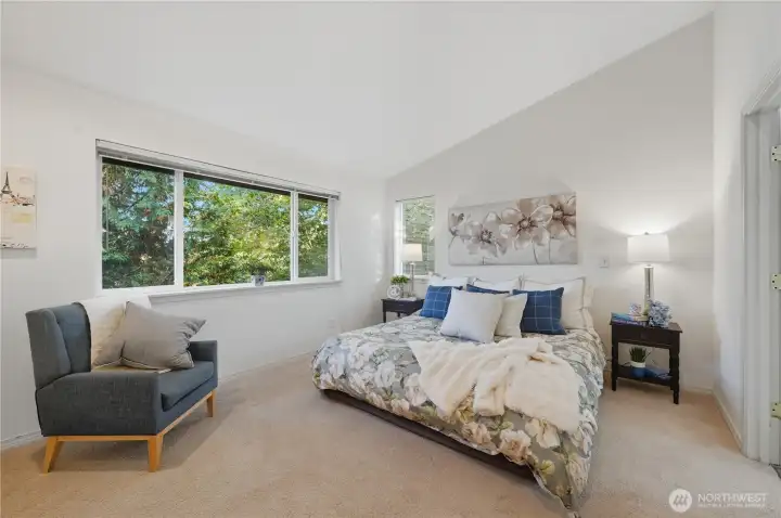 Primary Suite with vaulted ceiling and a full wall of clothes closets to accommodate your full wardrobe