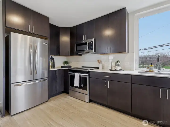 Your plants will love the sunny window over the kitchen sink