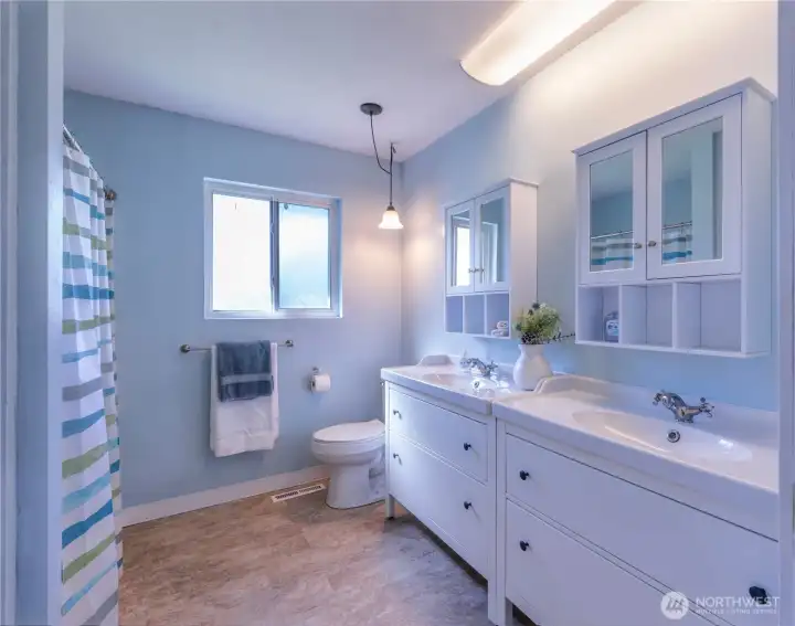 Upgraded full bath ~ everything is fresh and new.