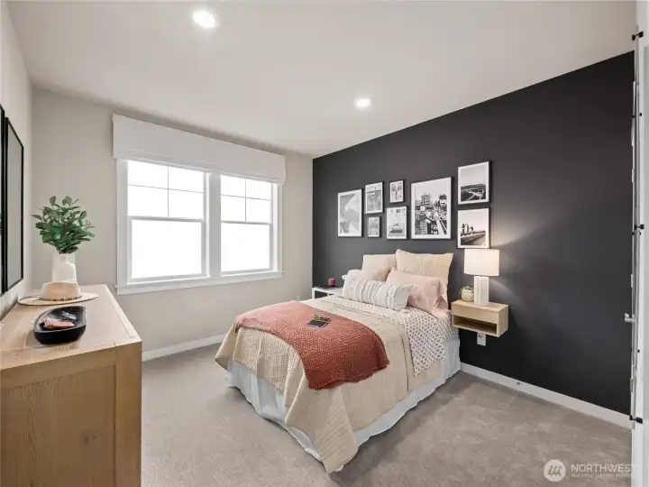 Bedroom/Office on main level with walk-in closet is one of the features makes this home desirable.   Photo is representational.  Actual home is under construction and finishes and colors will vary. See site agent for details.