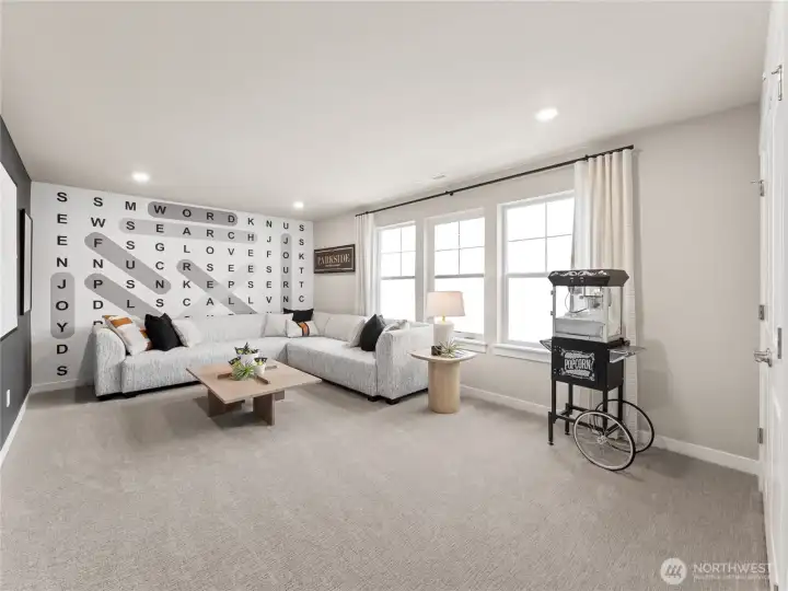 Bonus room or bedroom perfect for movies, games, or playroom. Photo is representational. Actual home is under construction and finishes and colors will vary. See site agent for details.