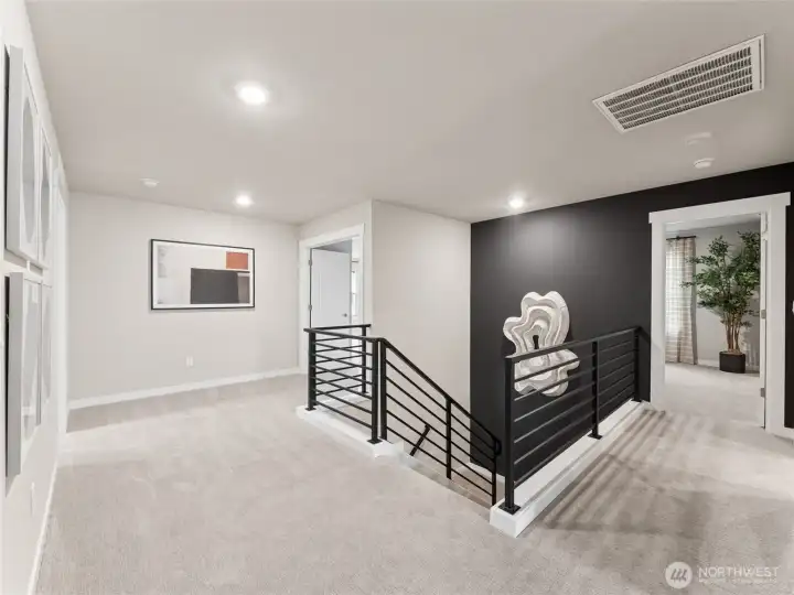 Metal open railing.  Photo is representational. Actual home is under construction and finishes and colors will vary. See site agent for details.