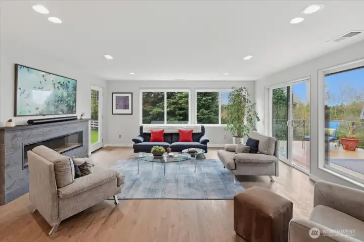 Family room with electric carbon friendly fireplace, Samsung Frame TV.  All walls modified during the 2022 renovation.