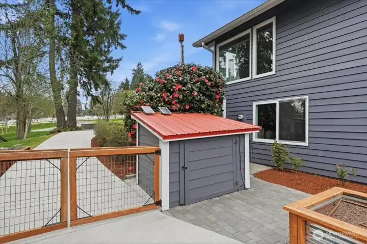 Picture of generator shed, which includes two heavy-duty Powerhorse 7500W/6500W inverter generator for quiet, reliable backup power with electric start.  Units operate in parallel, providing 15 kw of backup power.  Enough to power most of the things in the house (minus large load items – for example, all 3 ac units at the same time, oven, dryer).  The generator connects to the main panel via a transfer switch.