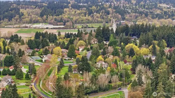 Territorial drone view of the Sammamish valley, showing Chateau Saint Michelle winery in the distance.