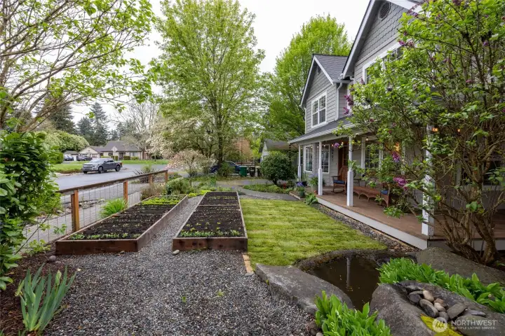 This home offers a friendly front yard to greet you and your guests daily.