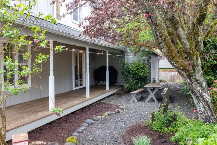 Enjoy dining al fresco in the summers or the sound of rain while relaxing on the covered porch.