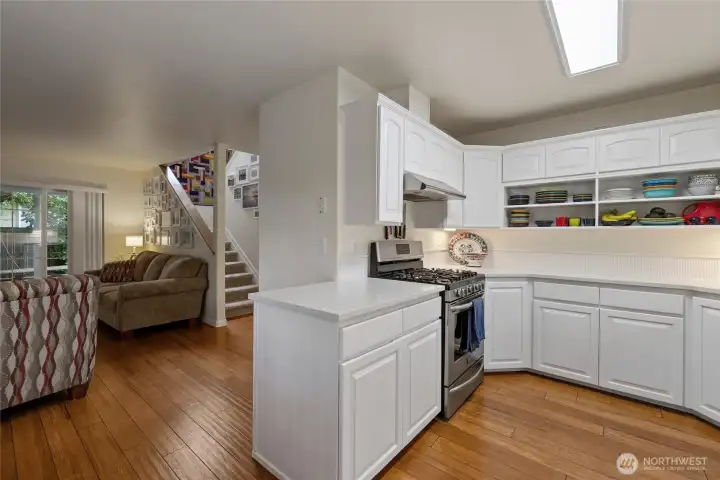 This floor plan flows into a kitchen space that shares an open concept while retaining a separate space for concentration that recipe's require.