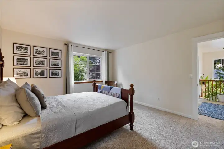 A room big enough to have a seating area, exercise, or meditation space.