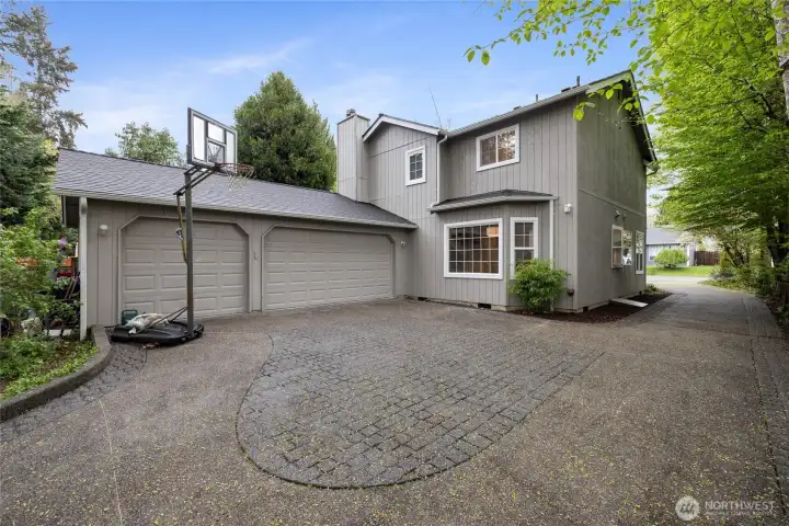 Who doesn't love a hidden three car garage?!