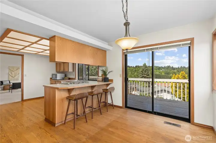 View from Kitchen Nook Corner towards kitchen and back deck