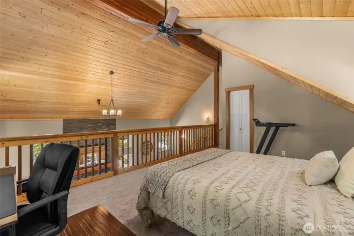 Loft - Warm pine ceilings create a cozy mountain feel, with room for guests, hobbies, or work.
