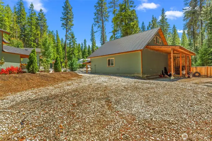 Covered 32' x 12' lean-to parking for boats, snowmobiles, and more