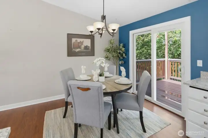 Gorgeous dining area with access to entertainment-size cedar deck and stairs leading to backyard Gorgeous dining area with access to entertainment-size cedar deck and stairs leading to backyard