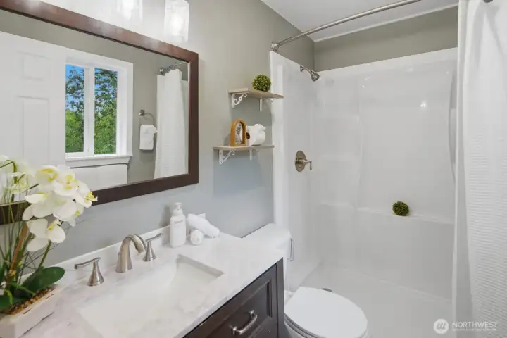 Primary ensuite bathroom with walk-in shower Primary ensuite bathroom with walk-in shower