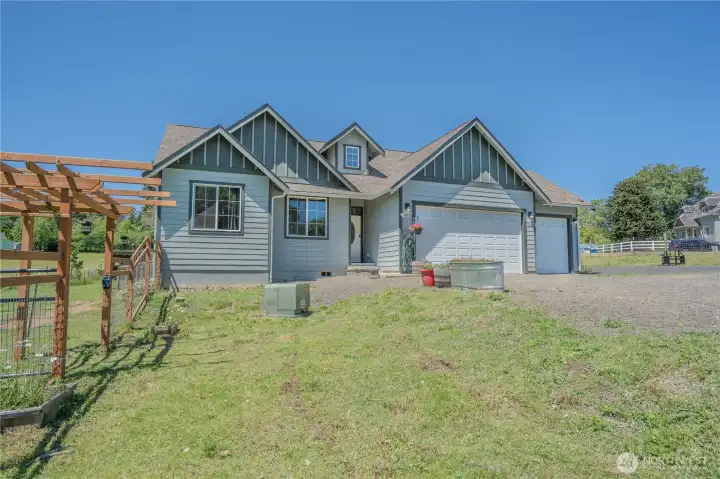 Enjoy beautiful natural light throughout the day with sunny southern exposure and peaceful views across your fenced acreage.