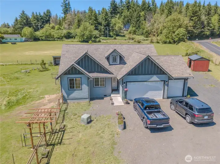 Three car garage plus plenty of adjacent parking on the east side of the house.