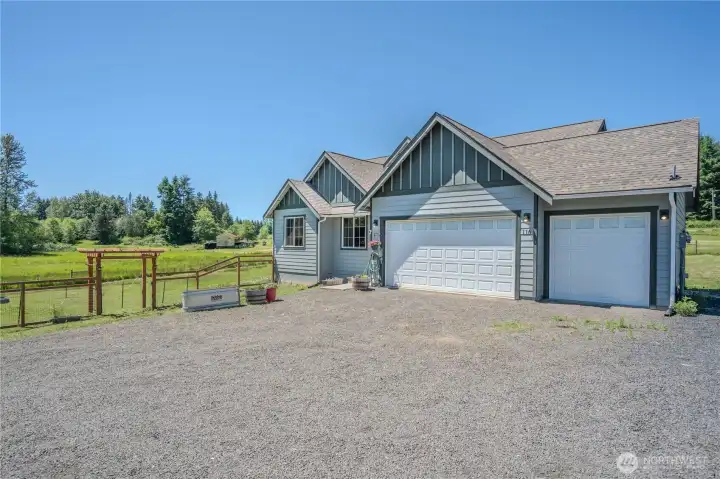 Large gravel apron allows for plenty of parking and easy maintenance.  Lots of gates to facilitate access to all parts of the property.