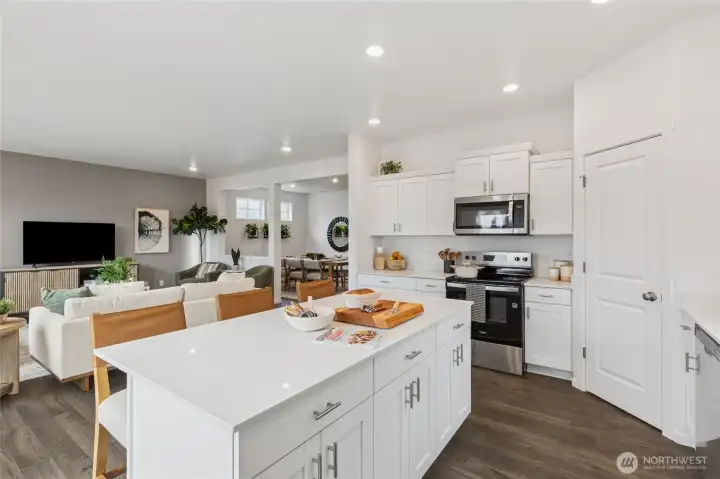 Large center island ideal for meal preparation and gathering.