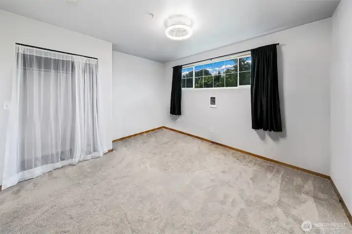 Large bedroom w/french doors.