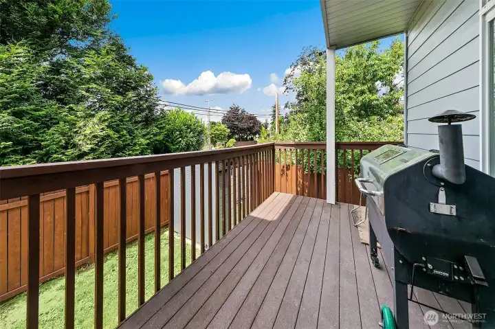 Trex deck with private backyard.