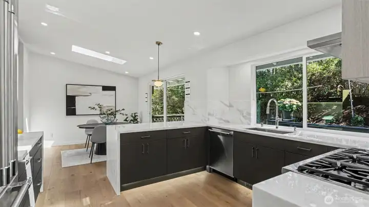 Under cabinet lights throughout the kitchen.