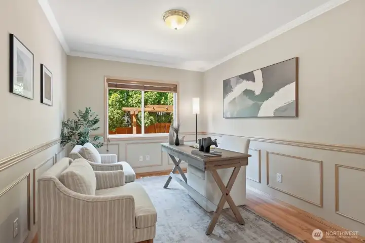 Located on the main floor, this versatile space makes an ideal home office, den, hobby room, or guest bedroom. Located on the main floor, this versatile space makes an ideal home office, den, hobby room, or guest bedroom.