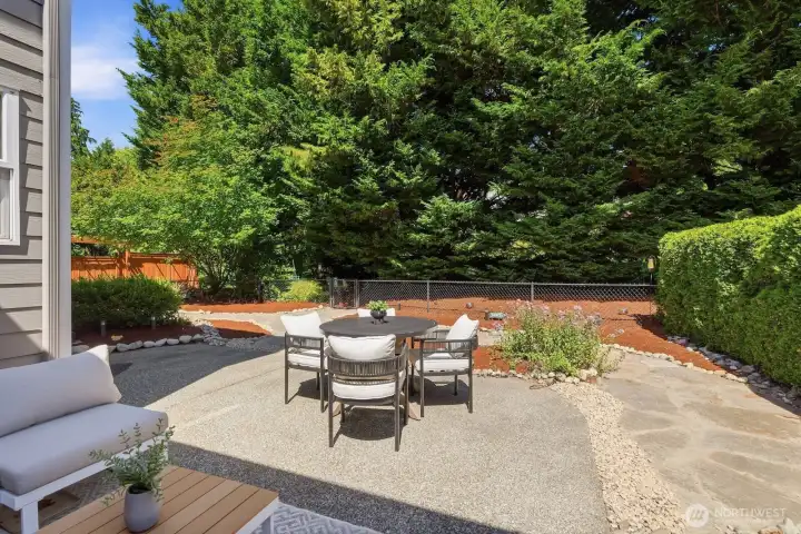 The private patio offers room for gatherings, outdoor dining, and quiet moments while taking in the beautifully landscaped surroundings and peaceful wildlife views The private patio offers room for gatherings, outdoor dining, and quiet moments while taking in the beautifully landscaped surroundings and peaceful wildlife views