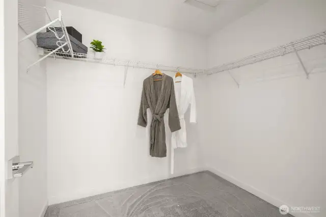 Step into a walk-in closet, a mini boutique waiting for your wardrobe! With ample shelving and hanging space, the organization has never looked this good.