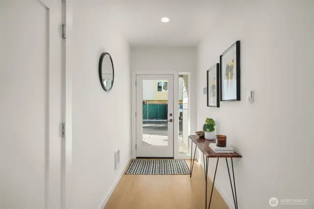 Natural light greets you as soon as you walk in. This airy entryway is about simplicity and sophistication, making every return home feel like fresh air.