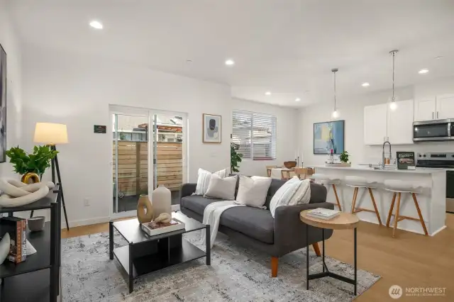 Open-concept perfection! The seamless connection between the living, dining, and kitchen areas makes entertaining effortless.
