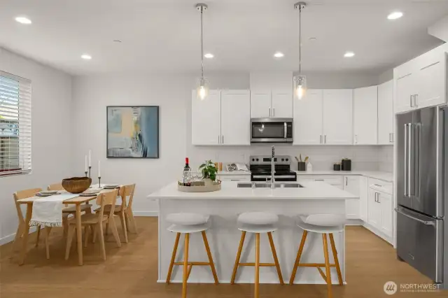 Gather, cook, and connect in a space designed for everyday living. The spacious kitchen flows seamlessly into the dining area, making serving delicious meals easy while staying connected to family and friends.