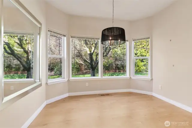 Dining area adjoining kitchen with great views to the private backyard.