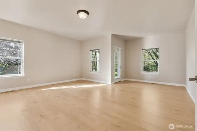 Primary bedroom, split bedroom floor plan, private, spacious oasis.  Room for sitting area.  Access to private covered patio.