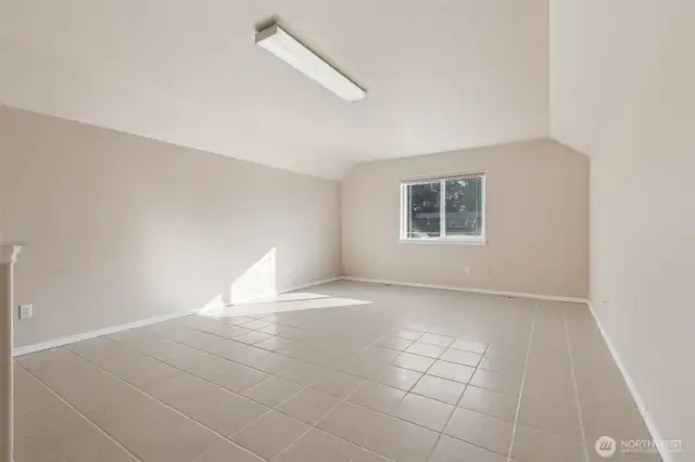 Bonus room over garage; access from laundry room.