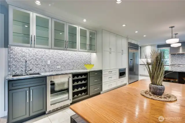 Wow! Huge wet bar with wine storage and beverage fridge.