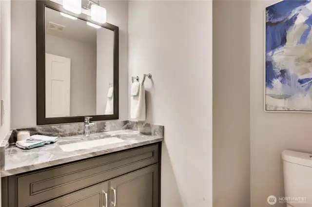 Gracious main floor powder room.