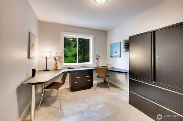 Main floor office. Customized furniture is included in this sale.