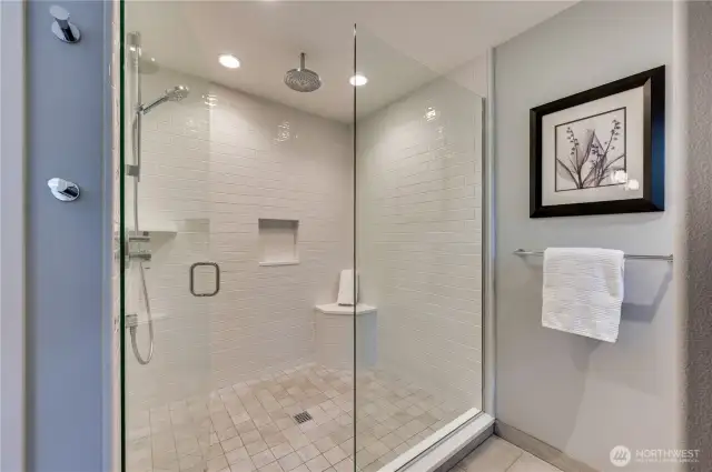 Large shower in primary also has a sylvan view.
