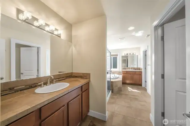 Primary bathroom - two sinks located conveniently with separate vanities.