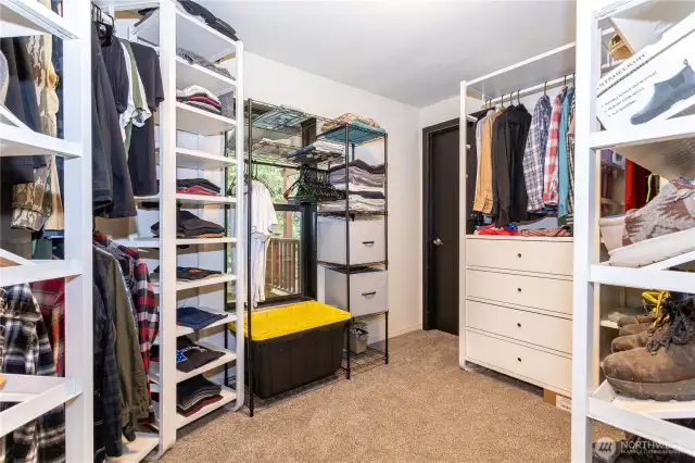 Walk in closet located in  bathroom attached to primary bedroom